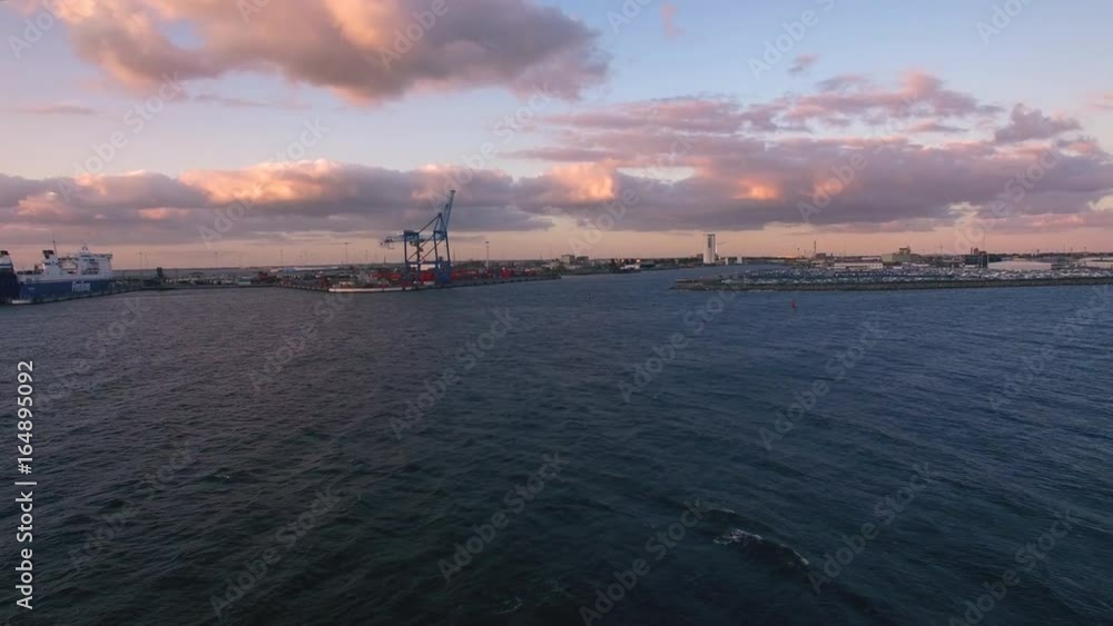 Aerial shot of cargo container terminal harbor at dusk Aerial shot of cargo container terminal harbor at dusk