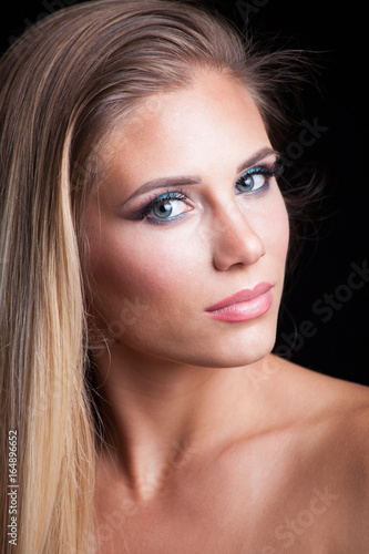 beauty young blonde woman portrait blue eyes studio