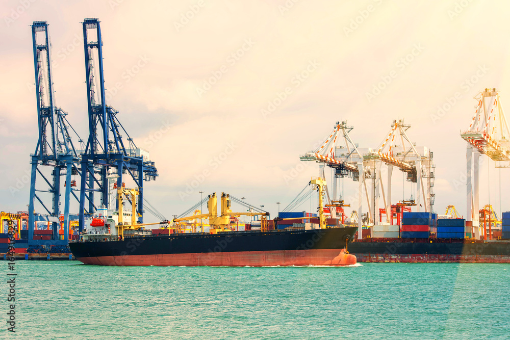 Fototapeta premium container ship in import export and business logistic.By crane ,Trade Port , Shipping,cargo to harbor.Aerial view.Water transport.International.Shell Marine.Top view.