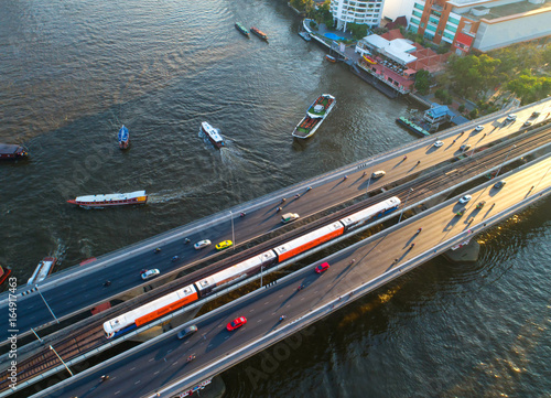 Transportation, cars, electric train, passenger boats in the urban community of Bangkok, Thailand .aerial view,Top view,