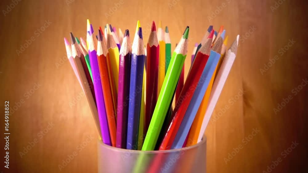 Bright mug with colored pencils Bright mug with colored pencils