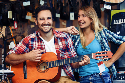 Cople in musical instrument store