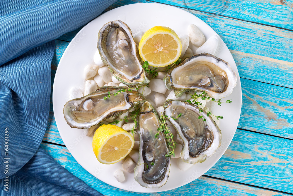 raw oysters with lemon and ice