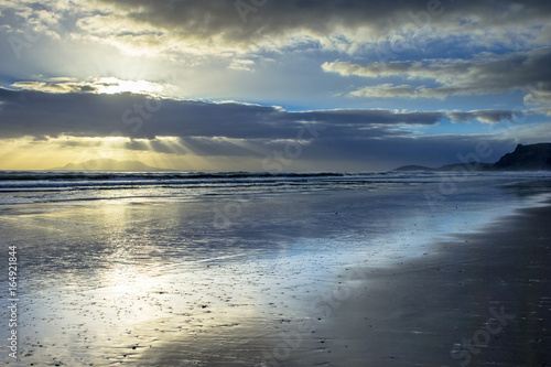 Sun Harp Through Clouds during Sunset over Hauraki Coast