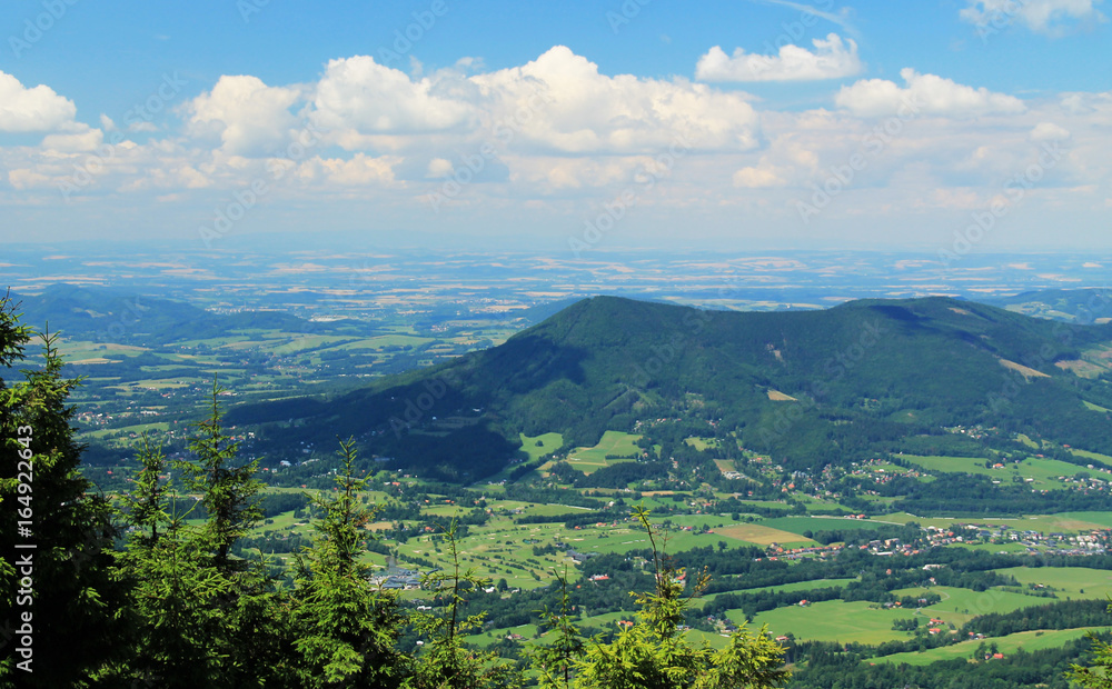 landscape of Beskydy mountains with green forests on nice summer day