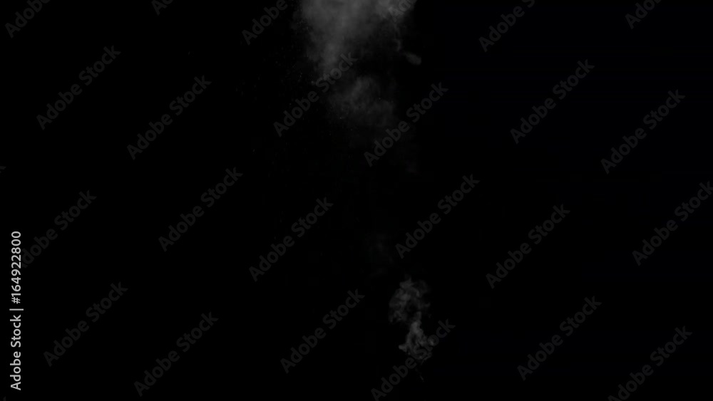 White water vapour on a black background. Close-up shot White water vapour on a black background. Close-up shot
