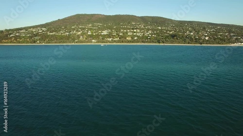 Forward flight towards Mornington Peninsula Coastline near McCrae suburb. Melbourne, Australia photo