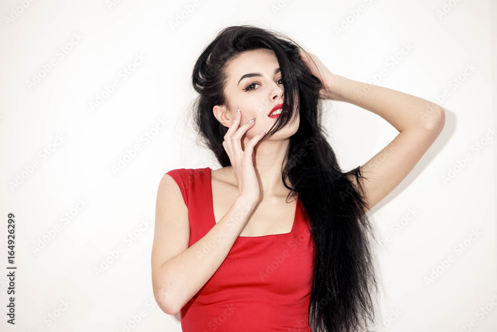 Beautiful sexy brunette girl with red lips in dress Beautiful sexy brunette girl with red lips in dress