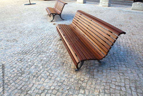 Lonely wooden bench in the park