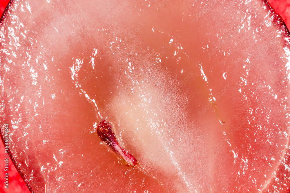 Fototapeta premium Red grapes in a cut as a background