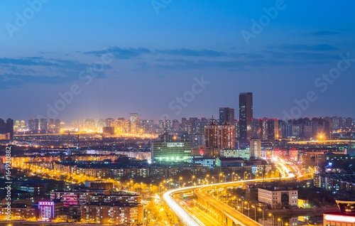 panoramic view of cityscape,midtown skyline at night,shot in China. © fanjianhua