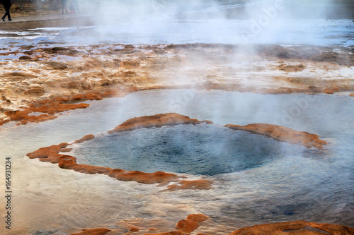 The Strokkur Geyser at rest at the Haukadalur geothermal area, part of the golden circle route, in Iceland