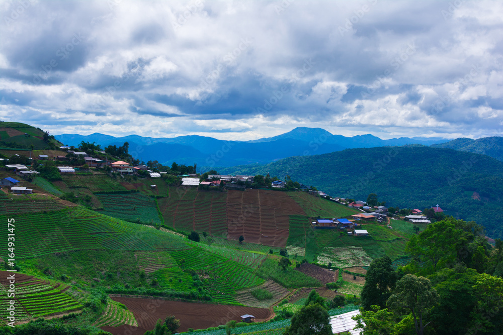 Hmong village,Mountain village,Mountain farming, blue mountain and cloudy.