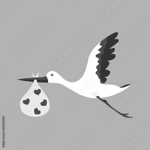 A stork carries a child, a stork in its beak carries a child