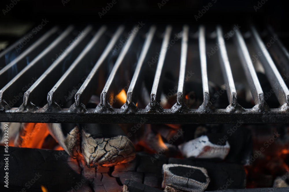 Empty Flaming Charcoal BBQ Grill With Bright Flames On The Isolated Black  Background. Weekend Barbecue Party Or Picnic Concept.can be used for  display or montage your products Stock Photo | Adobe Stock