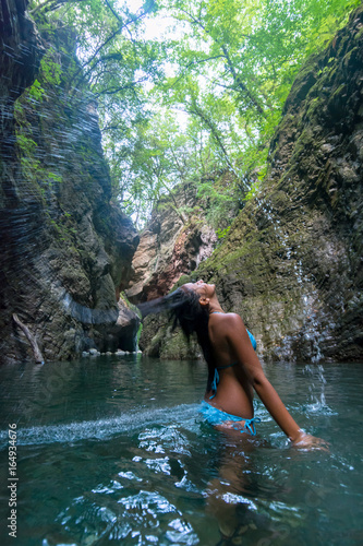 girl splashing water