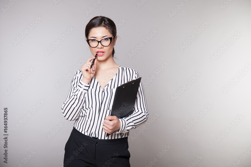 business girl in glasses works in the Office business girl in glasses works in the Office