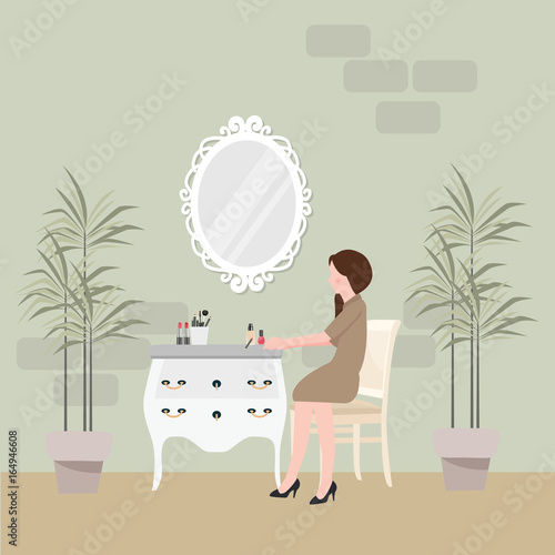 girl sitting in chair for make-up with table and mirror on front shabby chic style furniture