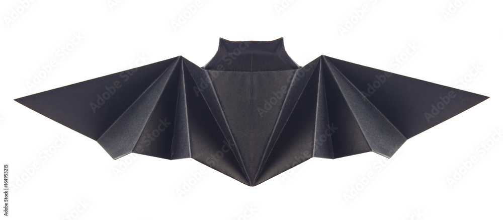 Obraz premium Black bat of origami, isolated on white background. Stock photo.