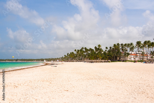 Fototapeta Naklejka Na Ścianę i Meble -  View of the sandy beach in Punta Cana, La Altagracia, Dominican Republic. Copy space for text.