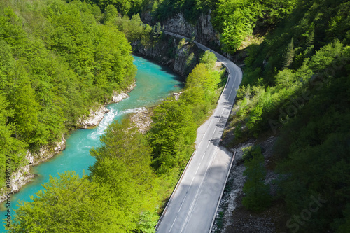 Highway along the river in the mountains  top view