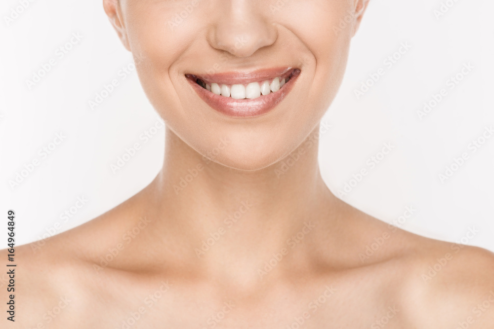 cropped view of smiling naked woman with perfect skin isolated on white cropped view of smiling naked woman with perfect skin isolated on white