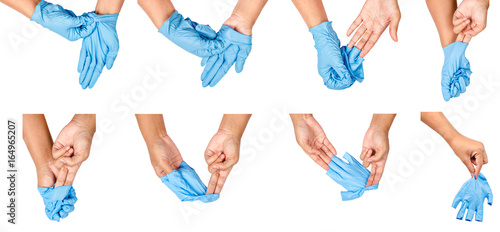 Step of hand throwing away blue disposable gloves. photo