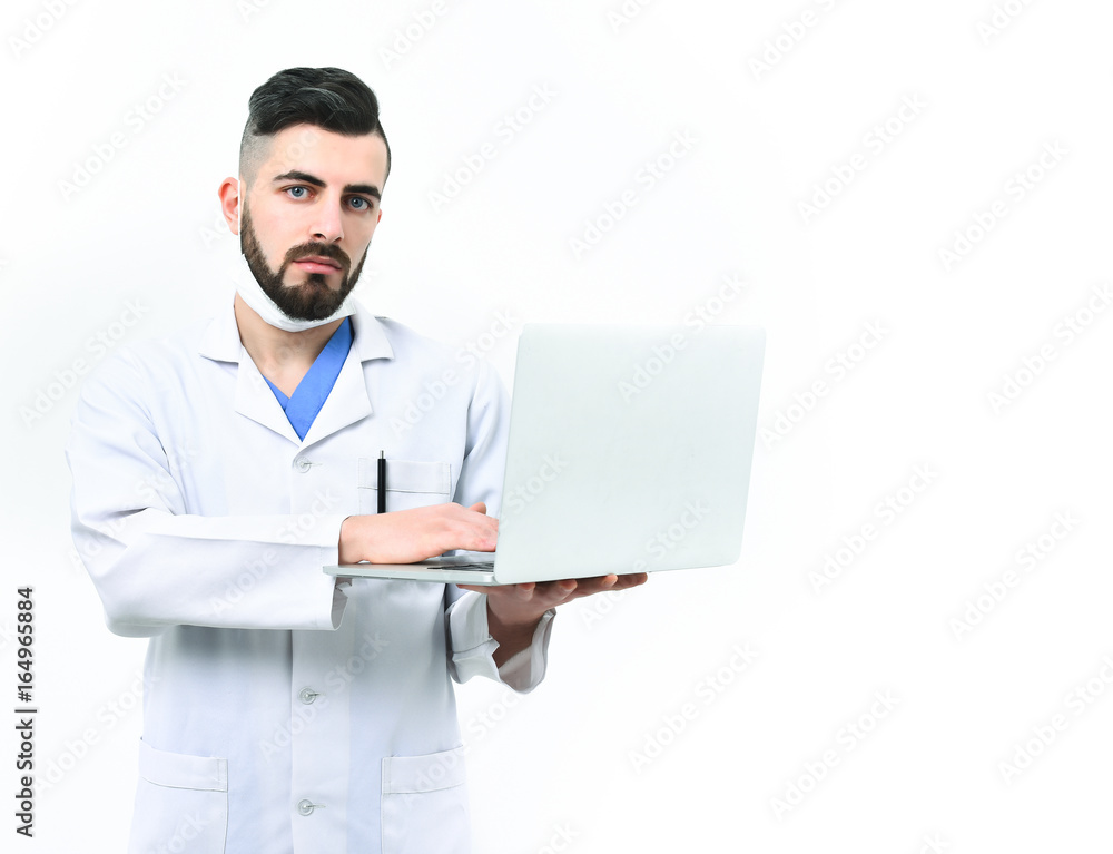 Man with concentrated face in white coat. Doctor with beard Man with concentrated face in white coat. Doctor with beard