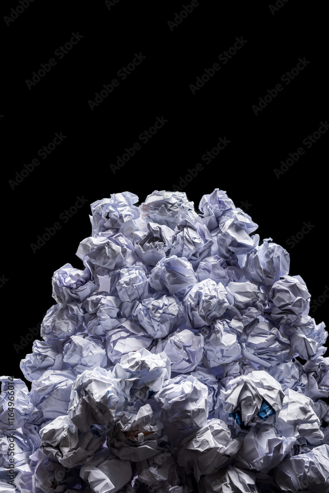 close-up view of big heap of crumpled papers isolated on black