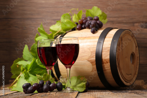 wooden barrel with red wine