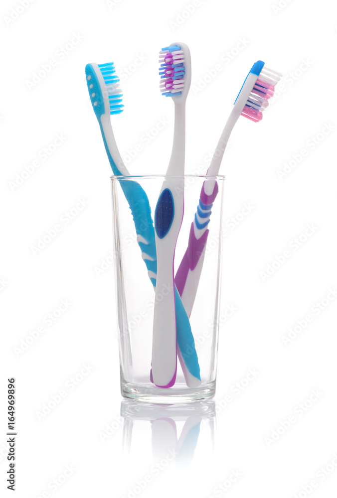 Colorful Toothbrushes in A Glass Colorful Toothbrushes in A Glass