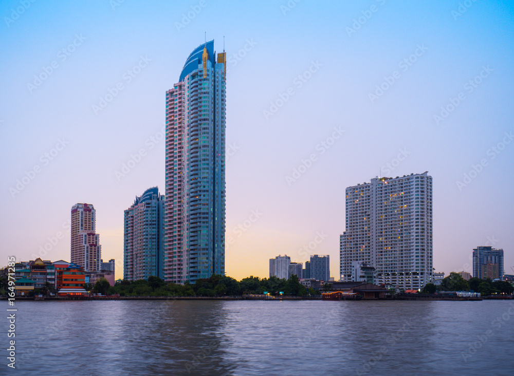 Naklejka premium The Building beside choapraya river.