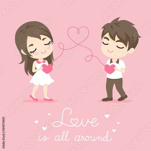Cute couple with heart shape on pink bacground