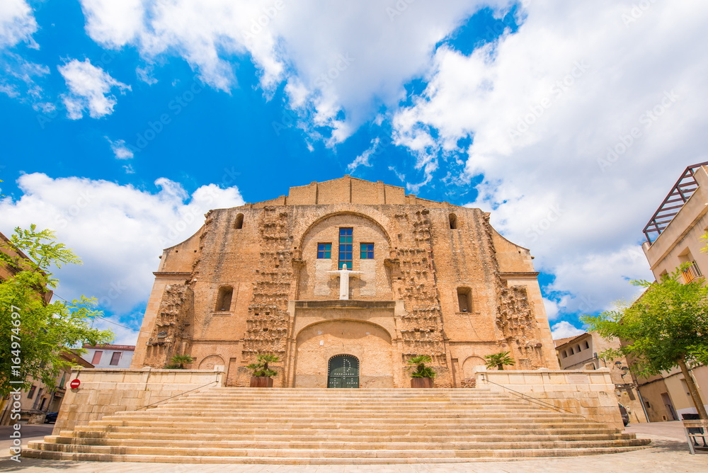 Fototapeta premium Church of San Miguel in Mont-roig del Camp, Tarragona, Catalunya, Spain. Copy space for text.