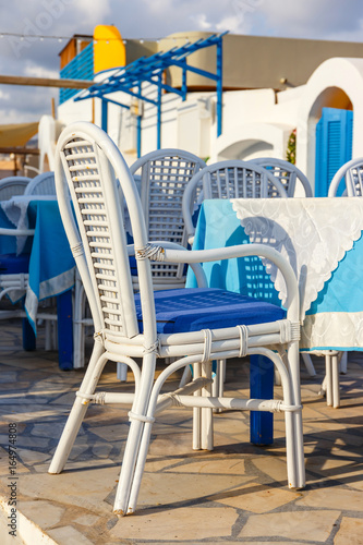 White and blue colors of traditional Greek tavern. Crete Island, Greece © dziewul