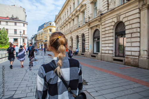 Obraz na płótnie blonde girl Travel on streets of Bucharest. Romania w salonie