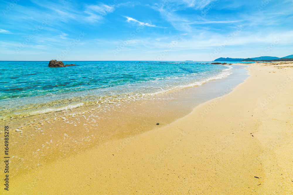 Golden shore in Santa Giusta beach