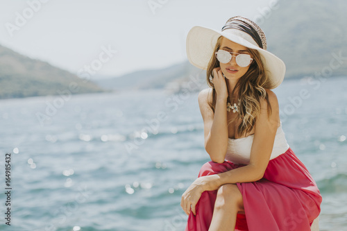 Young attractive woman with...