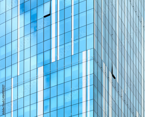 Wallpaper Mural Glass facade of modern building. Cloudy sky reflects in glass Torontodigital.ca