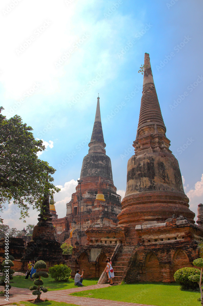 Fototapeta premium Two ruined pagodas in Wat Yai Chai Mongkol in Ayutthaya province Thailand