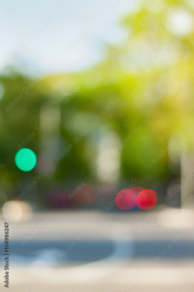 Vertical background photo.Cityscape bokeh. Defocused abstract city.Background out of focus.Can use as wallpaper,design. Summer blurry city backdrop.Travel out of focus photos. Fairy defocused photos