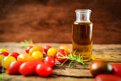 Olive oil and tomatoes photo