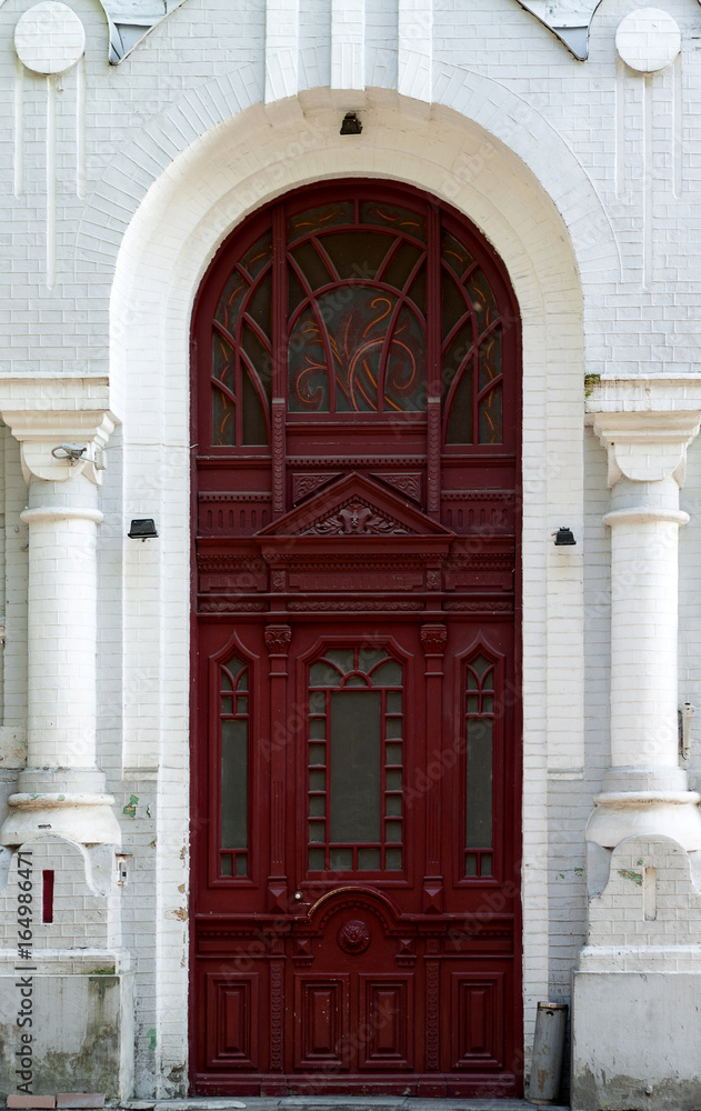 The door of old building with columns