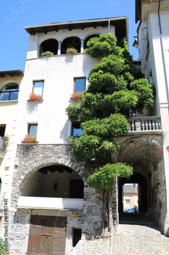 Typical historic alley in in Orta San Giulio at Lake Orta, Piedmont Italy