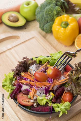 Salad on wood table  Healthy food concept