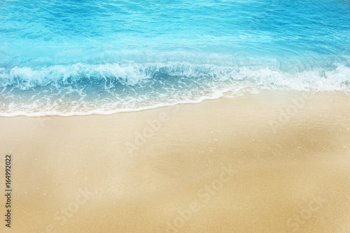 Soft wave of ocean on the sandy beach © 26max
