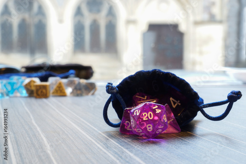 A set of polyhedral dice with a draw string bag photo