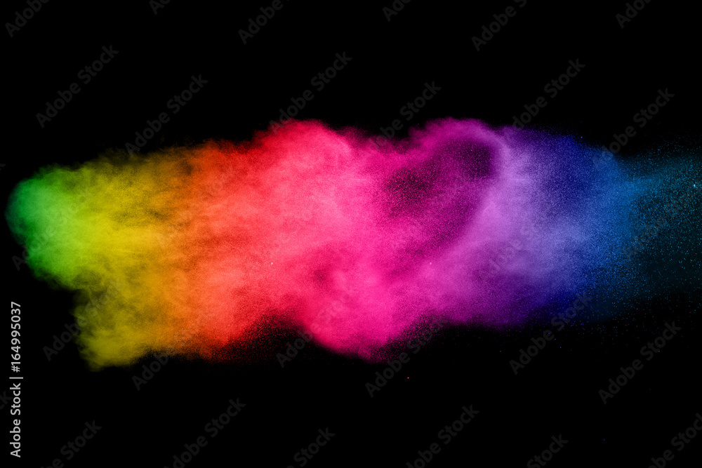 abstract color powder explosion on  black background.abstract color powder splatted on black background. Freeze motion of color powder exploding.