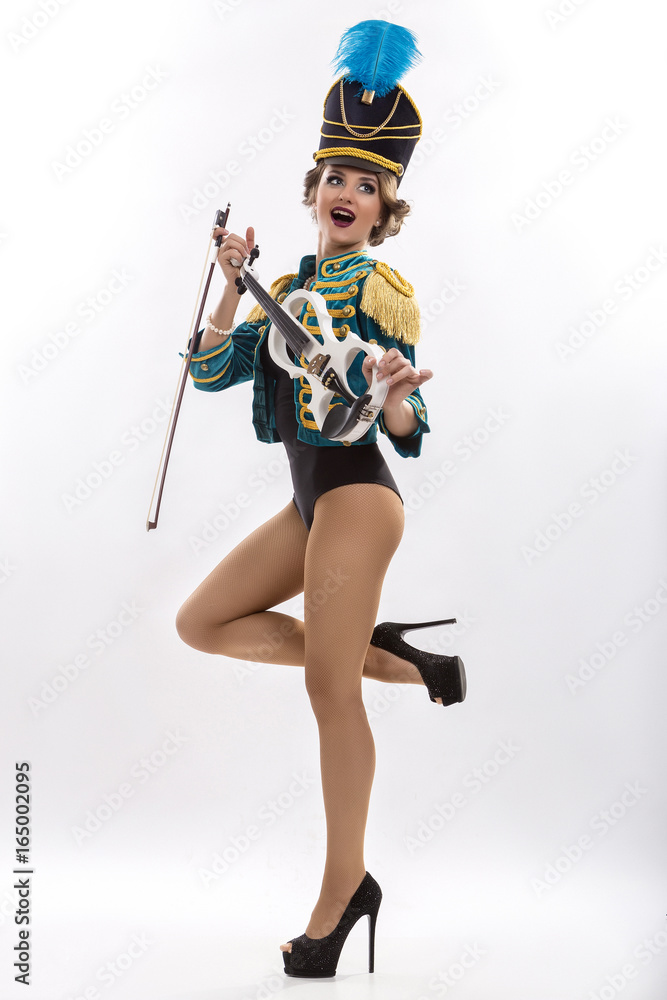 Girl violinist. Girl, violinist. European with a violin. In the costume of a hussar. Show. Girl violinist. Girl, violinist. European with a violin. In the costume of a hussar. Show.