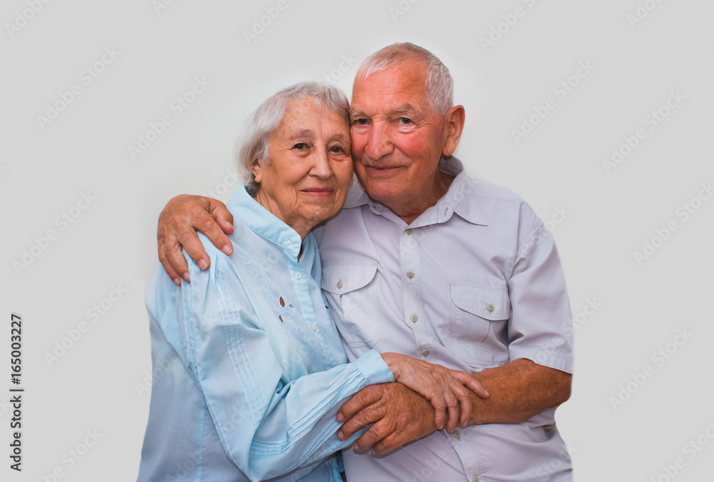 The elderly couple on studio background The elderly couple on studio background